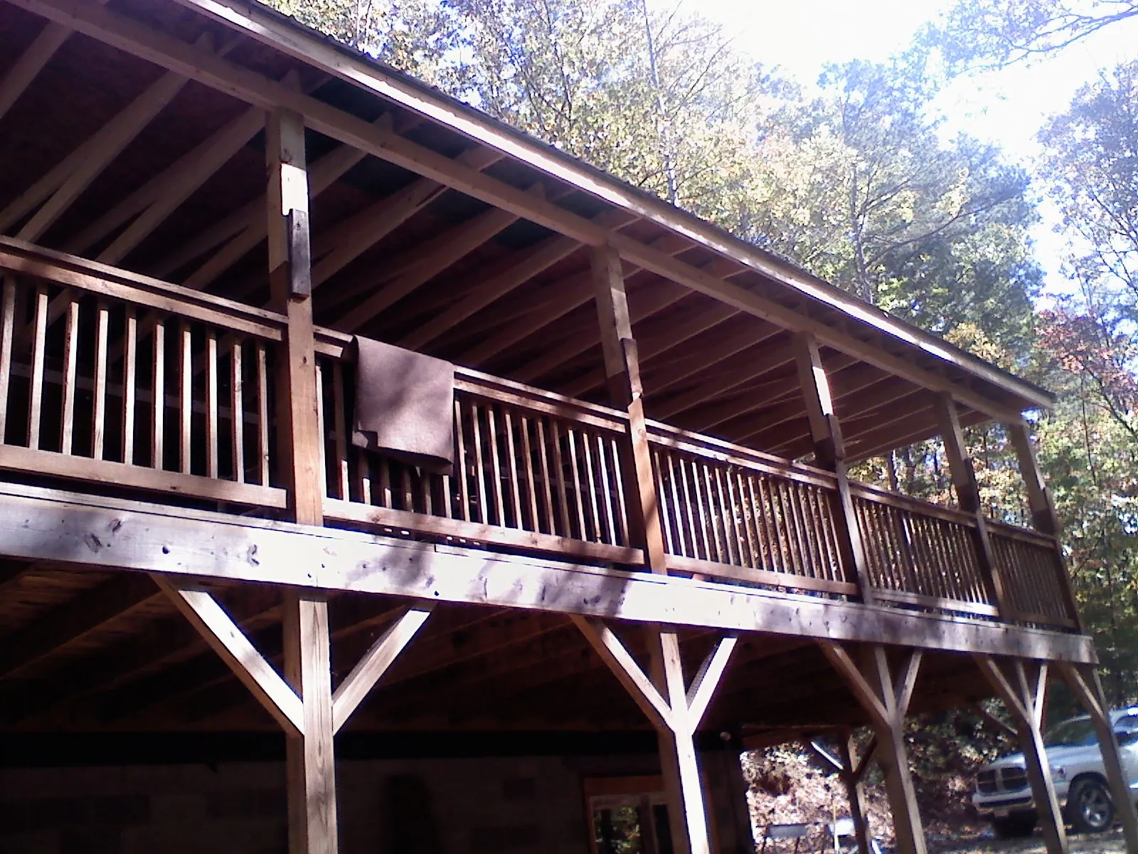 Timber framing under a new elevated porch and deck — Roof Leak Repair in Lorida by Roofing Brothers